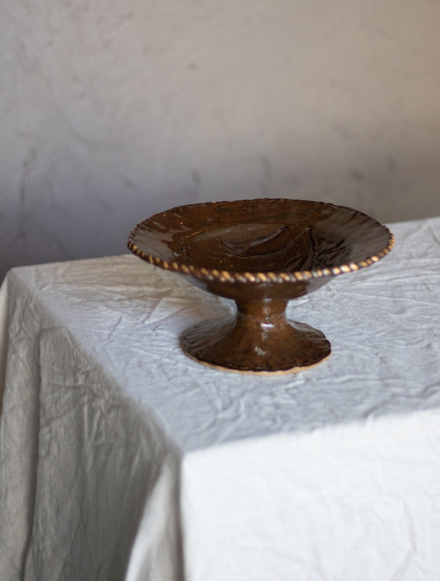 Small Umber Pedestal Bowl with Gold Rim