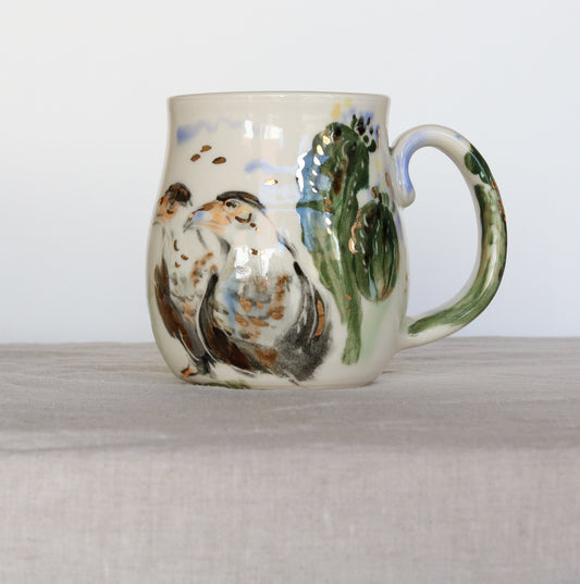 Crested Caracara and Flowering Sagauro