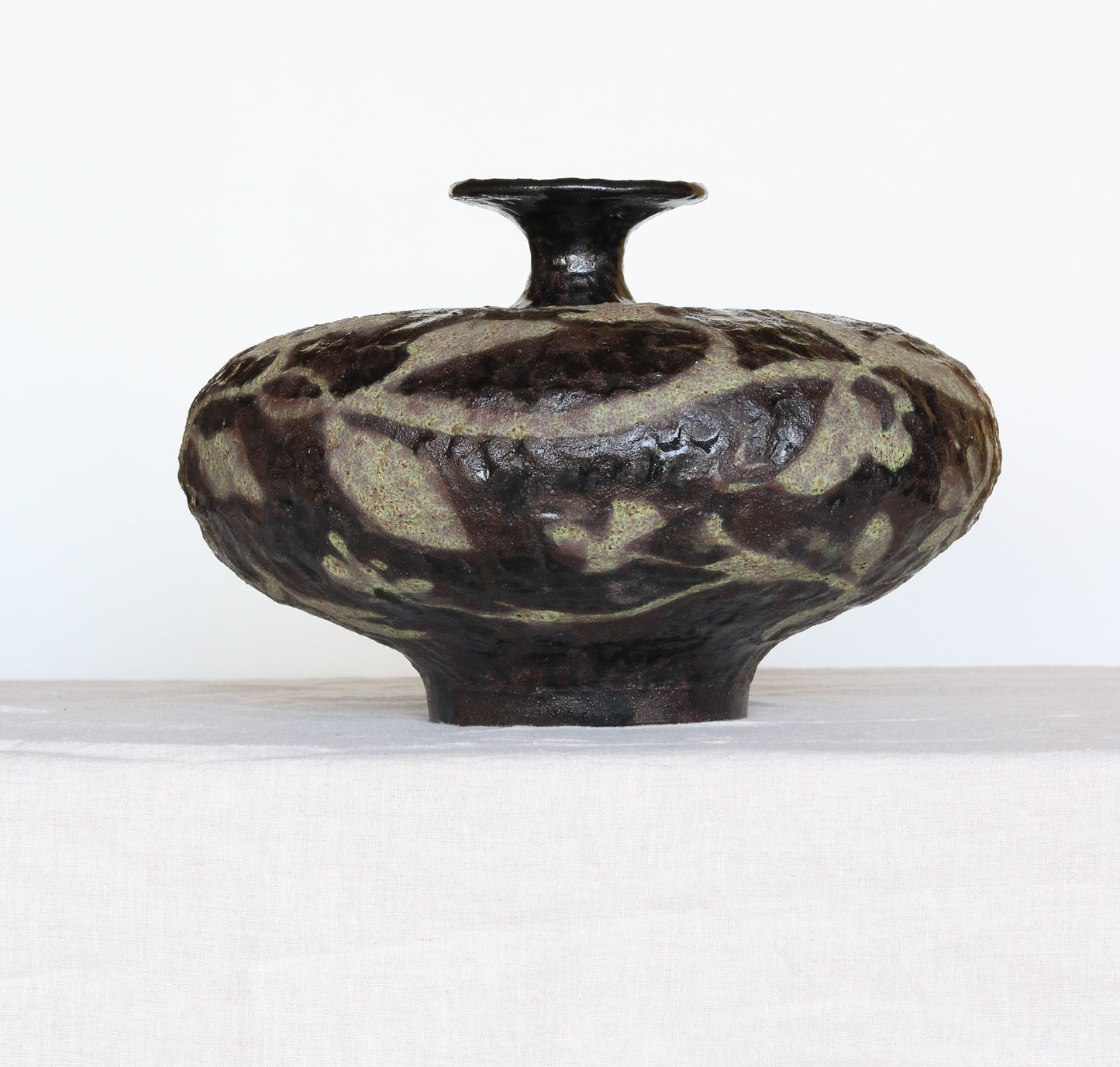 Stout Noir Vessel with Vine and Floral detail.