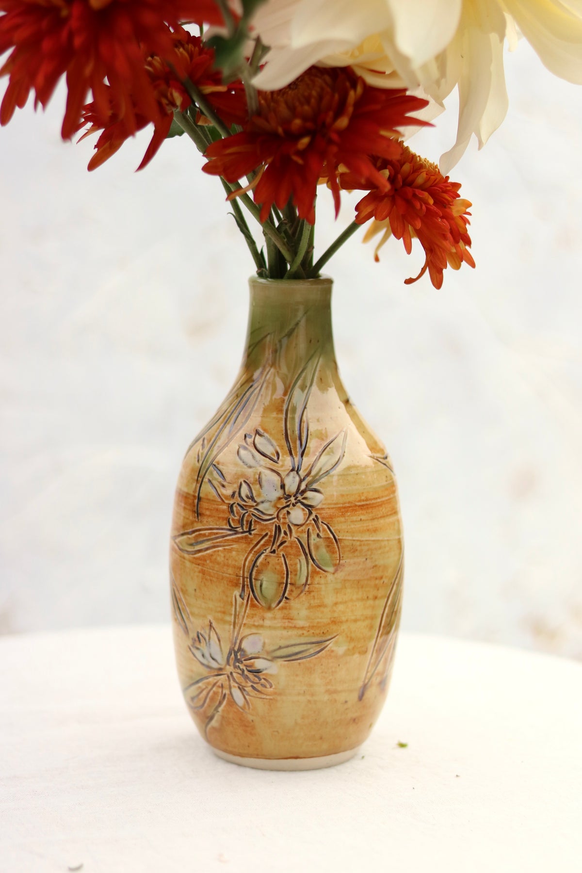 Hand Carved Botanical Vase in Olive Branch
