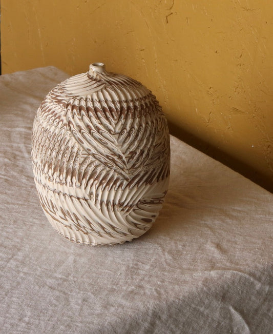 Round Carved Bottle Vessel from Marbled Clay