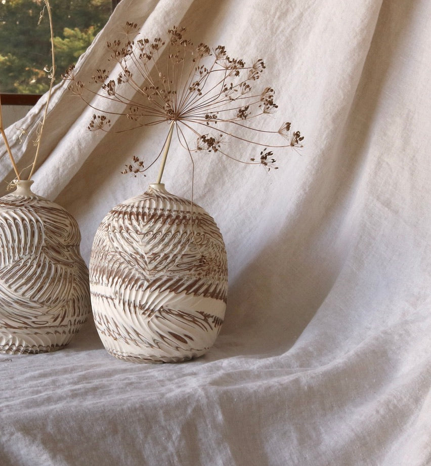 Round Carved Bottle Vessel from Marbled Clay