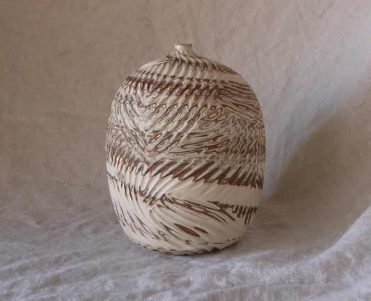 Round Carved Bottle Vessel from Marbled Clay